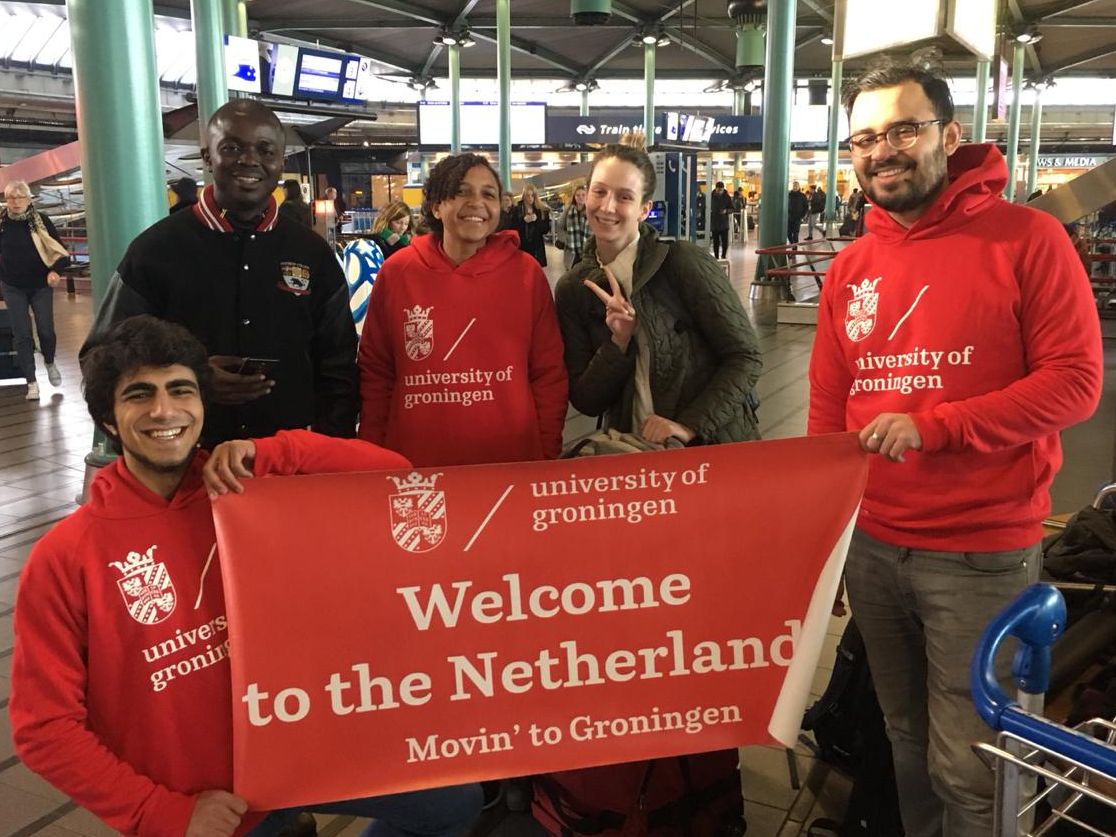 the welcoming team in their bright red hoodies