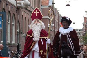 Sinterklaas and Zwarte Piet during an entry parade. Photo: Michell Zappa. Obtained from Wikimedia Commons and used under the Creative Commons Attribution-Share Alike 2.0 Generic license