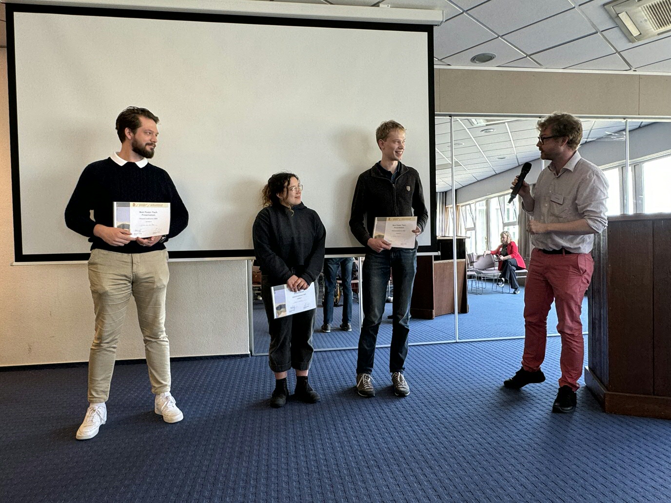 Julien, Melina & Sietze (Best flash presentation) with jury chair Johannes Klein
